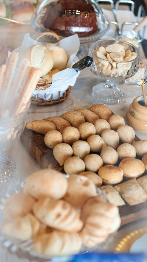 various pastries displayed on serving dish at table