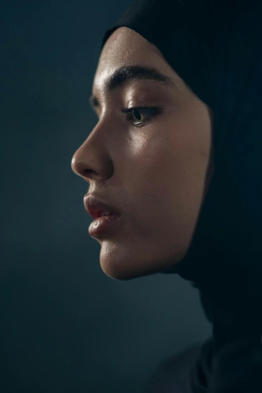 close up portrait of a muslim girl in profile