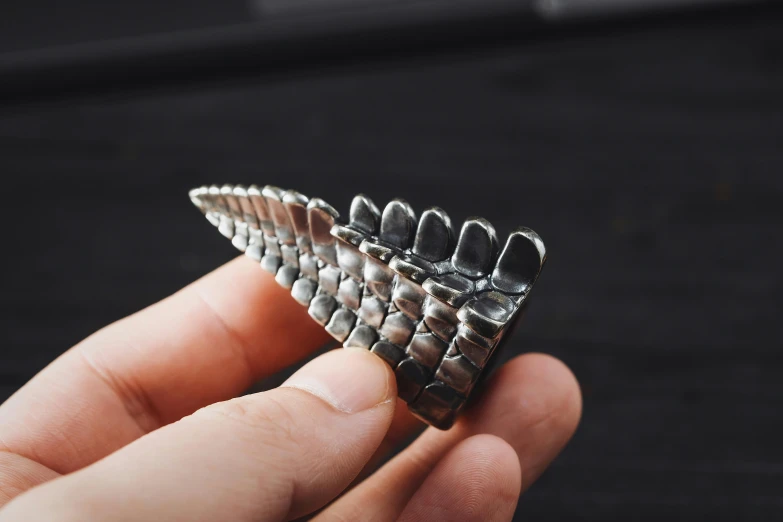 the metal comb is made with a long wire