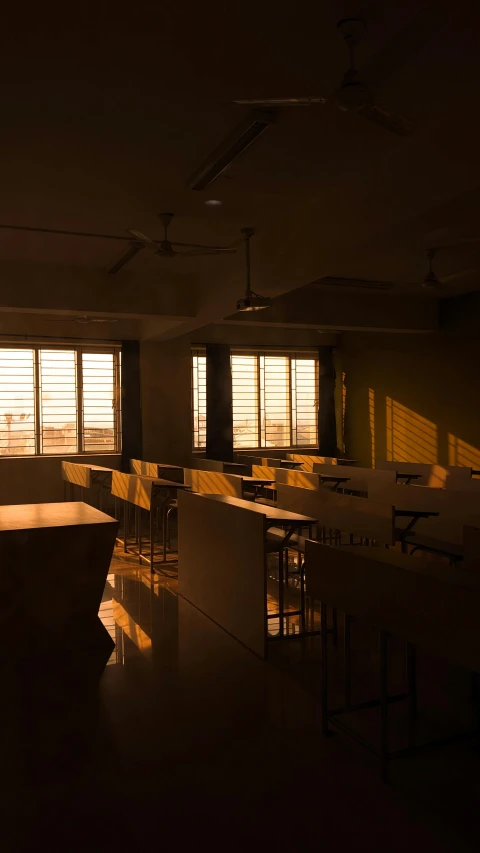 dark room with desks, counter and windows