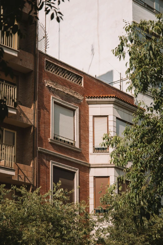 an apartment building with a balcony and balconies