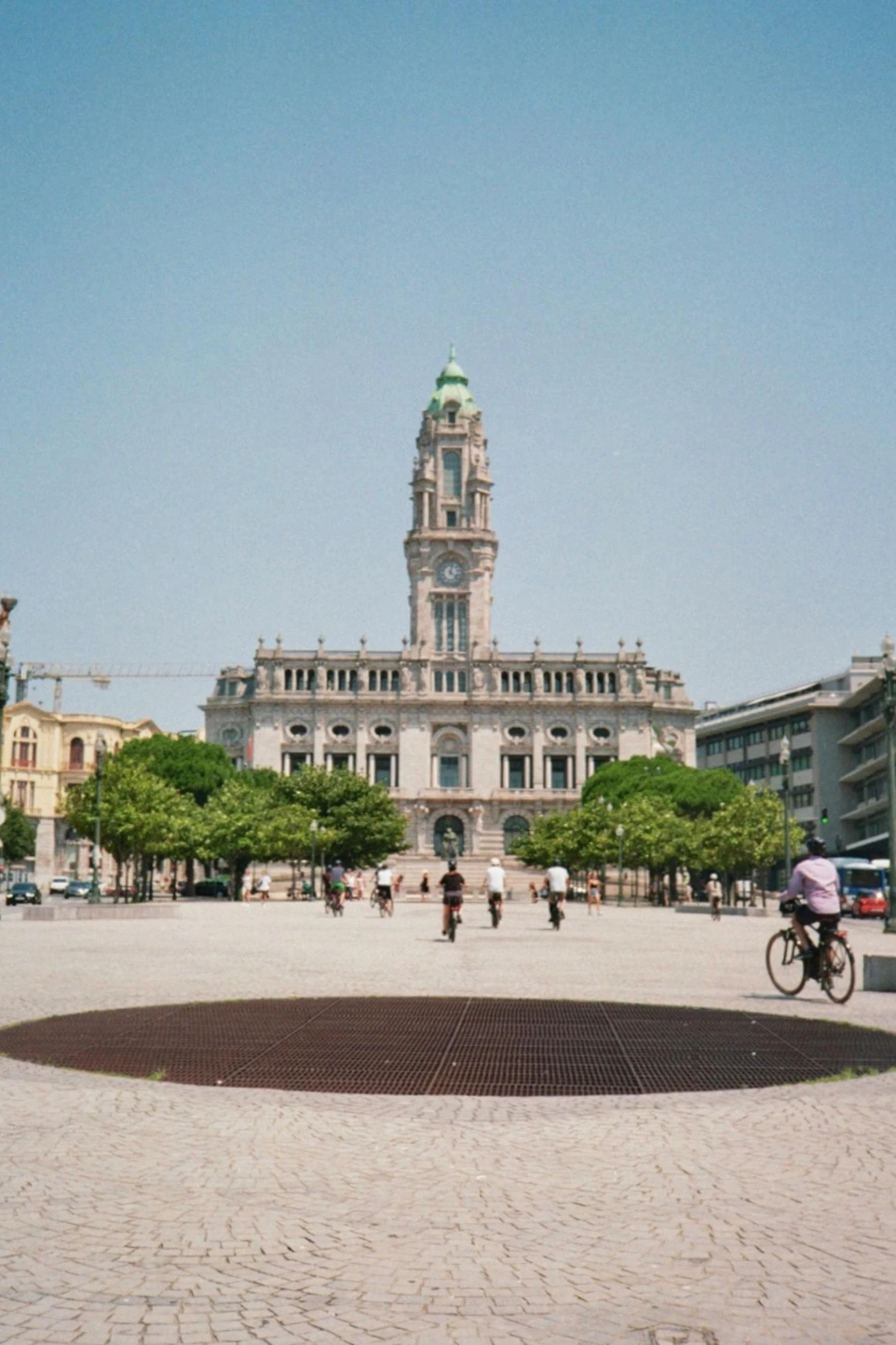 the building has tall steeples at the top and spires