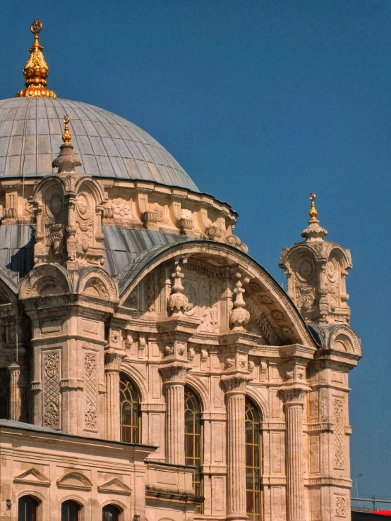 large ornate building with a domed gold top