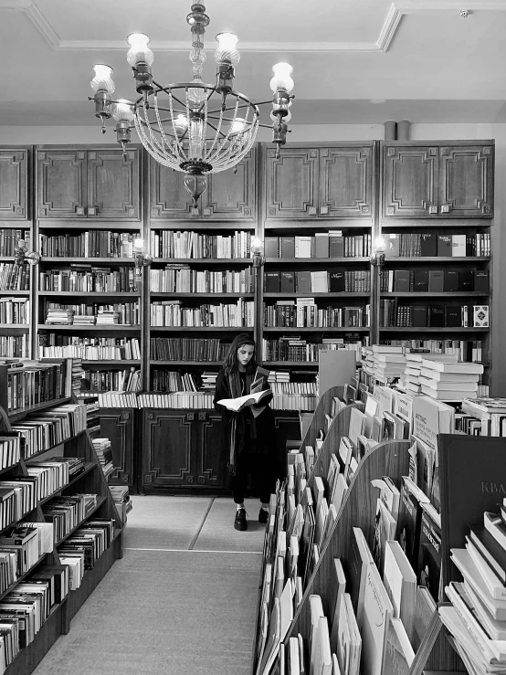 a black and white image of a book store