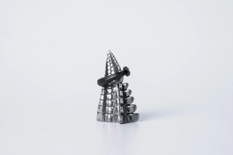 this is a figurine of an object in the style of chess pieces