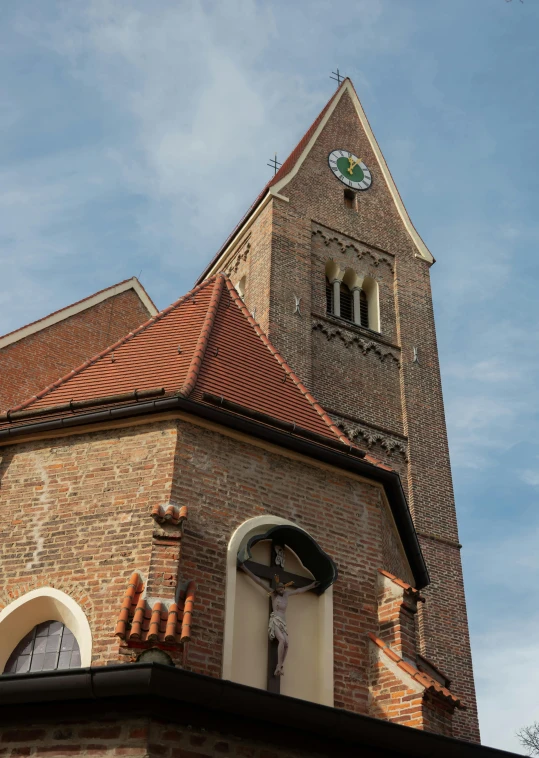 a very tall brick tower with a clock on top