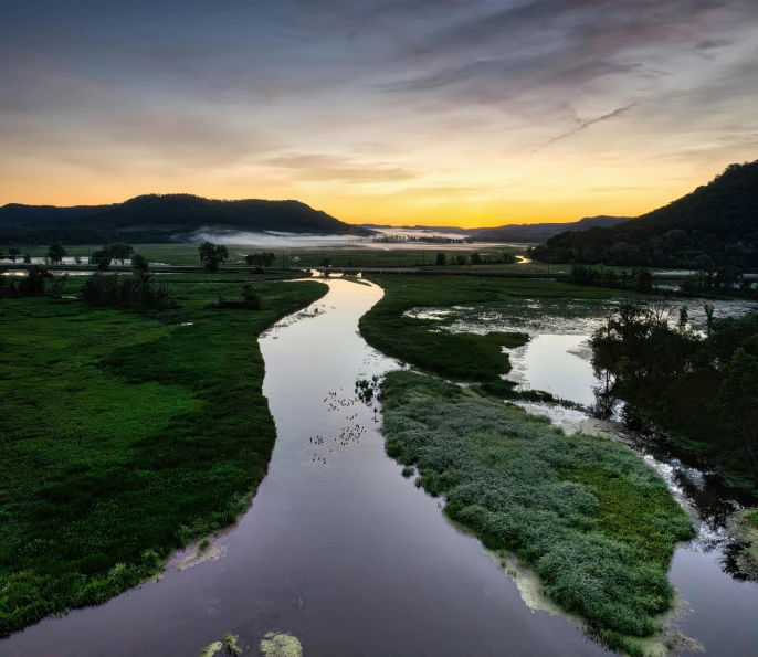 there is a river running through the land in this picture