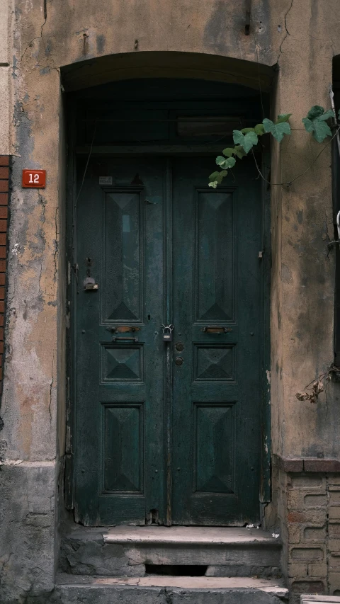 a door sitting in the corner of a building
