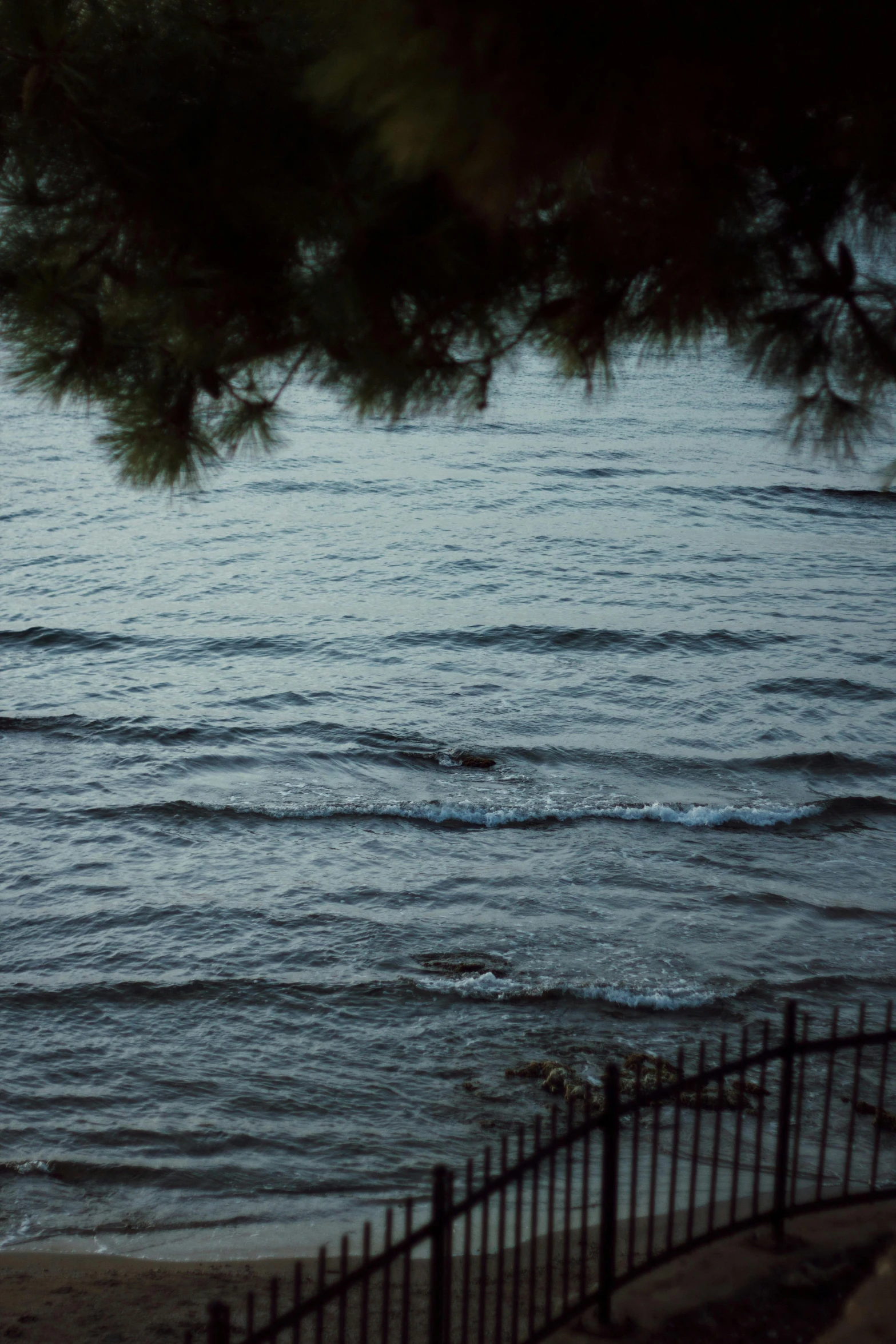 people are out on the water, surfing in the ocean