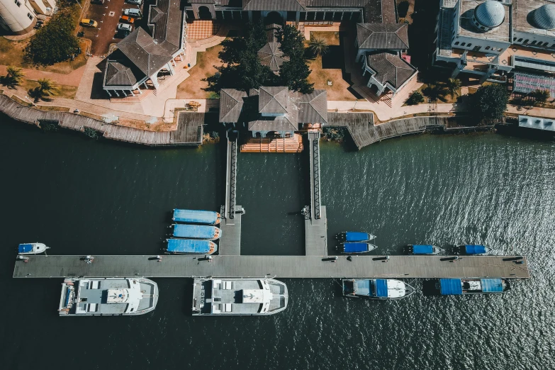 an aerial po of several boats in the water