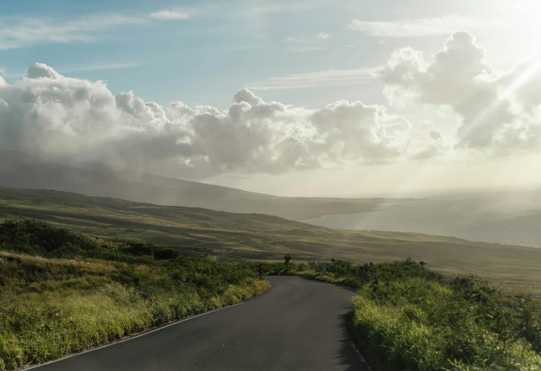 an image of a road on top of a hill