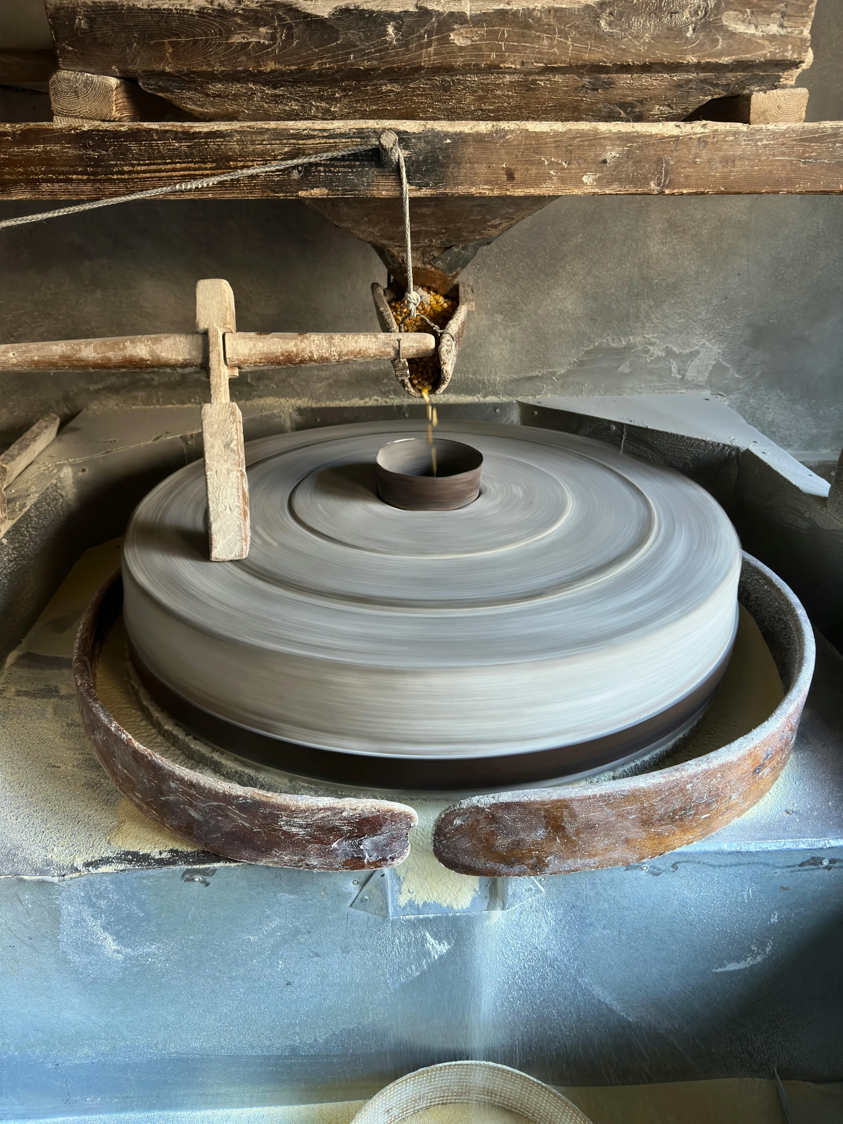 the wheel with a piece of wood sitting on top of it