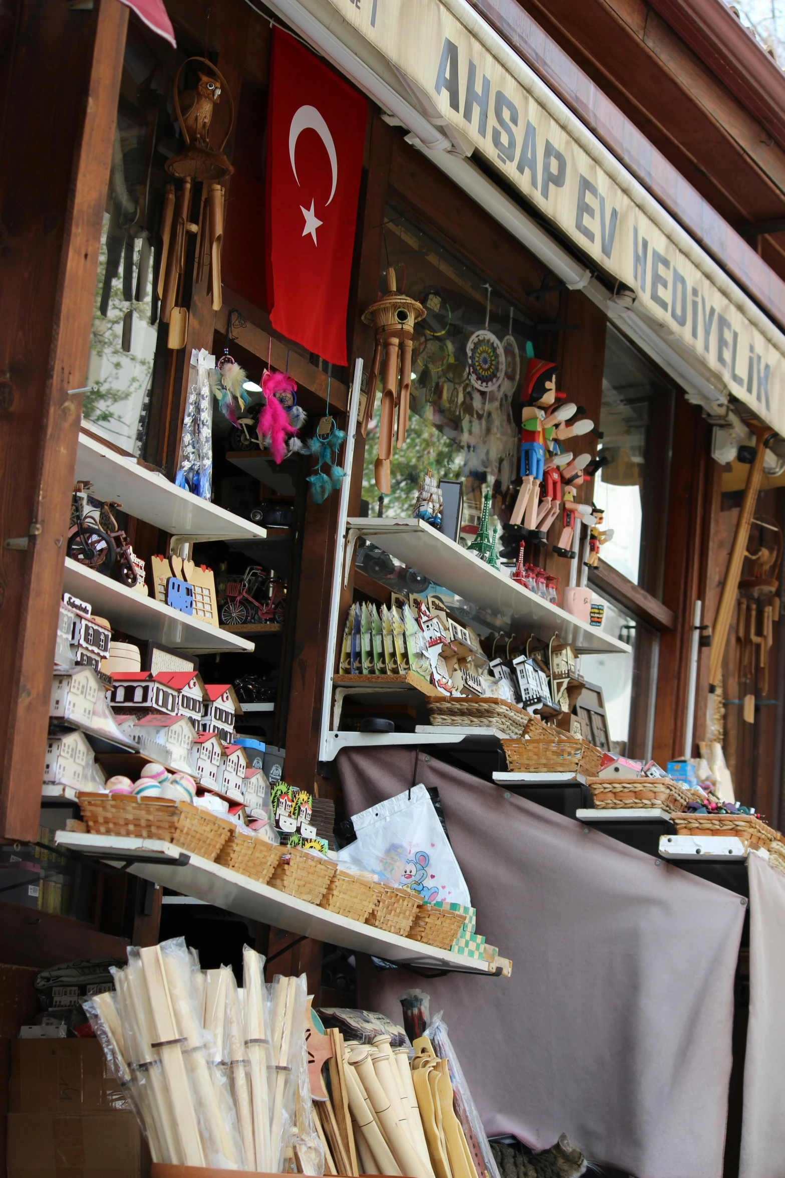 there is a shop front with many different items