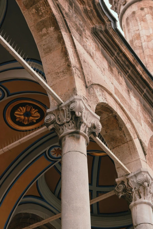 a building with many pillars and intricate designs