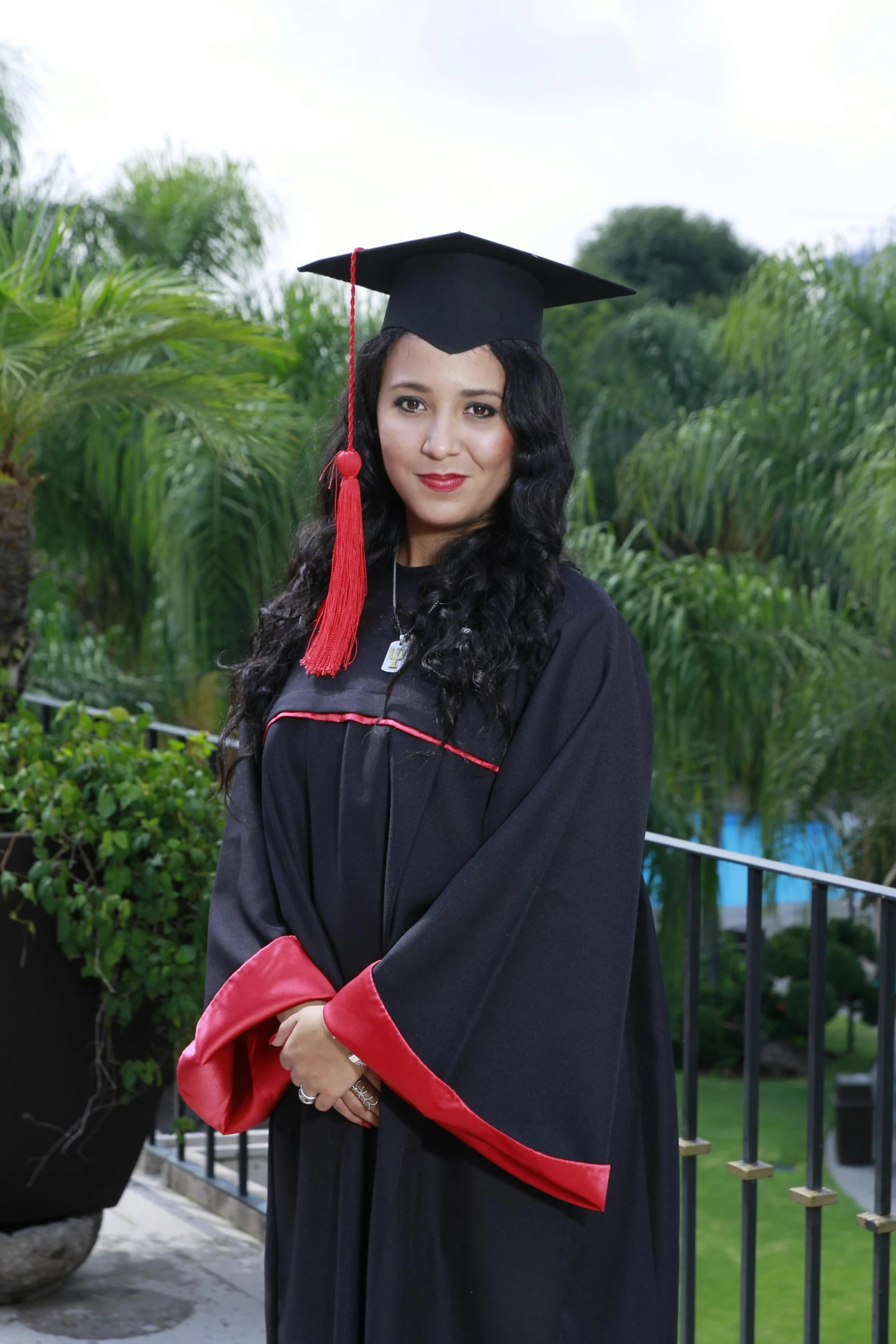 a beautiful young woman in her graduation gown