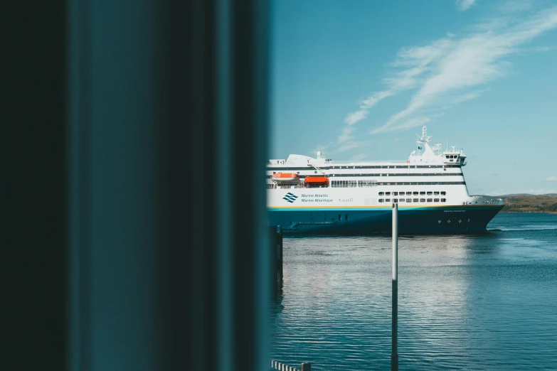 a ship docked in the middle of the water