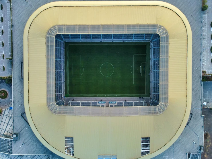 an aerial view of the stadium showing the pitch and fans