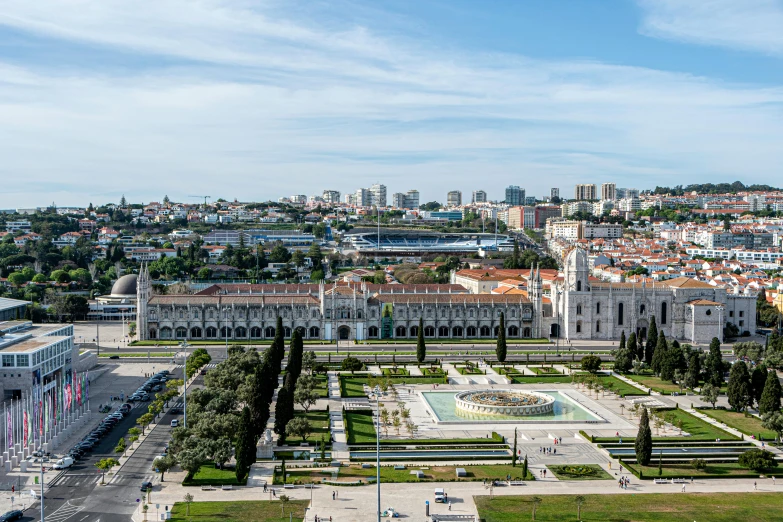 a park near an ornate building in a city