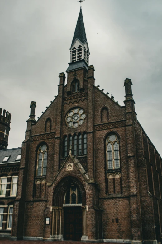 an old building has a steeple with clock on it