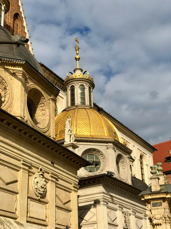 a view of a golden dome on top of a building