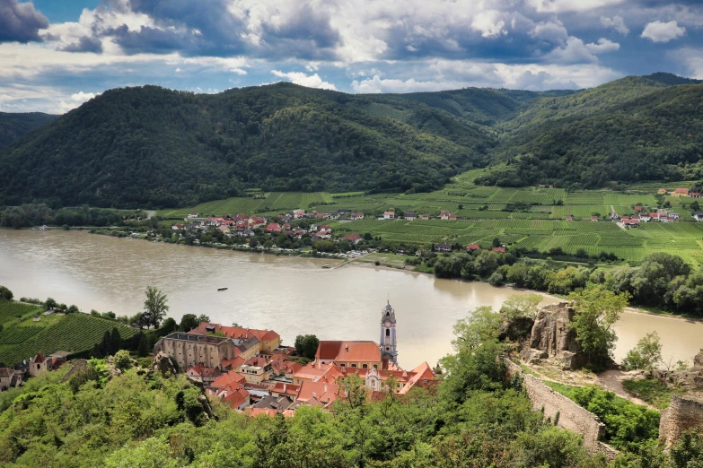 a small village nestled in a valley surrounded by mountains