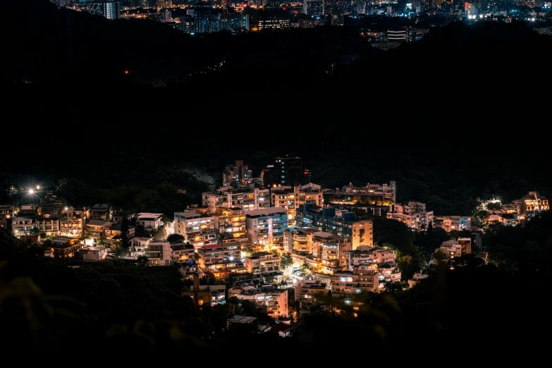 an aerial view of a city at night time