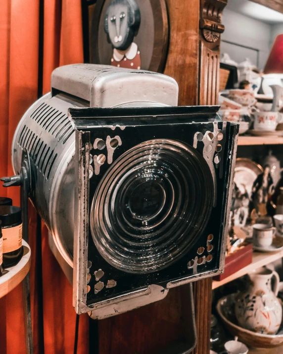 an old vintage camera is on display in the store