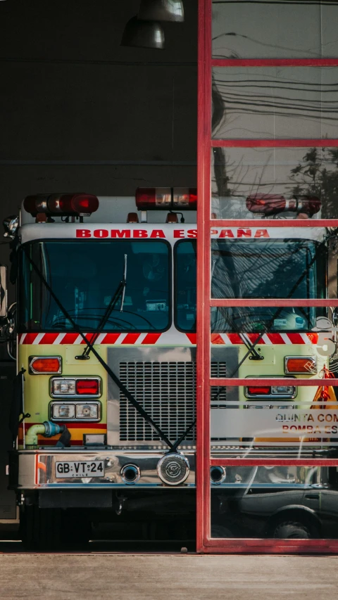 a fire truck parked in the garage door