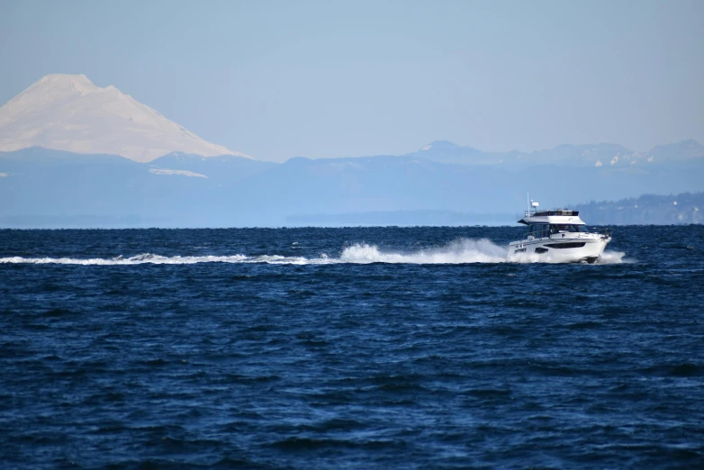 the motorboat comes in for some air as it speeds across the water