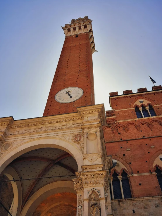 clock on the tower in a historical building