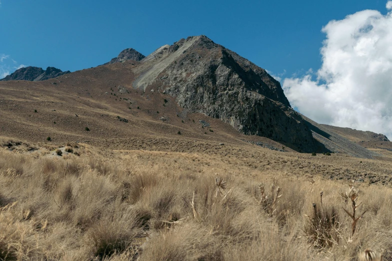 the mountains are barren on a clear day