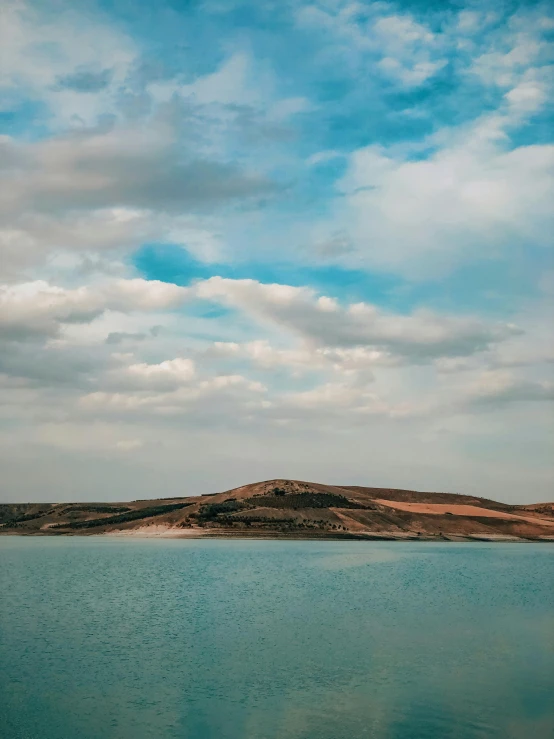 a large body of water surrounded by land