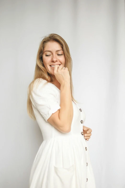 a lady posing for a camera with her mouth open