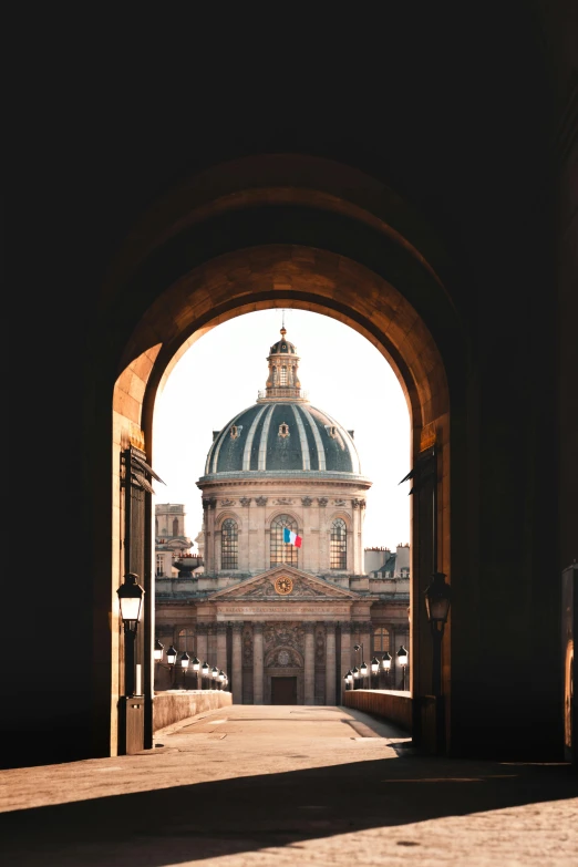 a building with a dome sitting above it