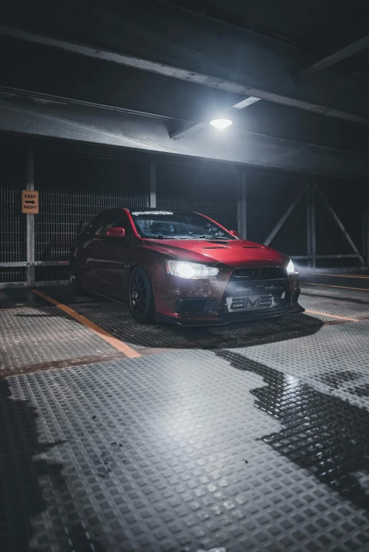 a car is parked in an empty garage