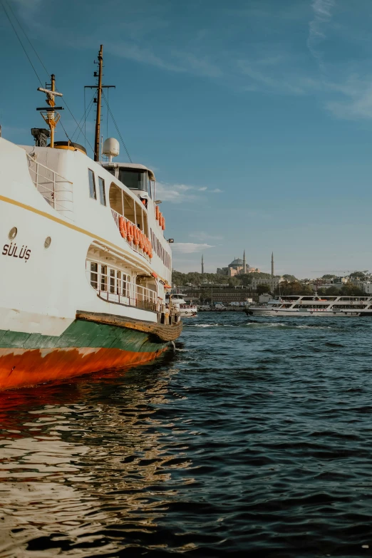 the ferry boat is traveling through the water