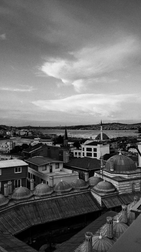 an old view of a city skyline taken from atop