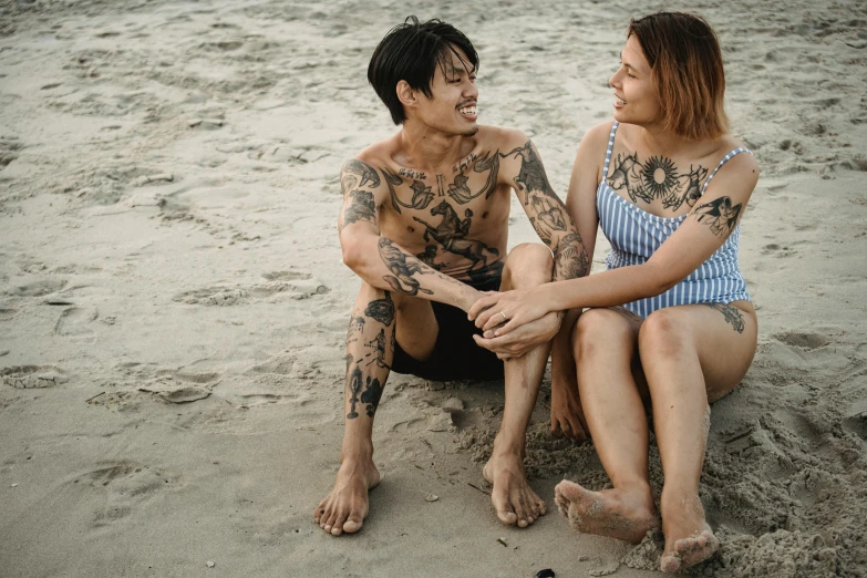 an image of a couple that are on the beach