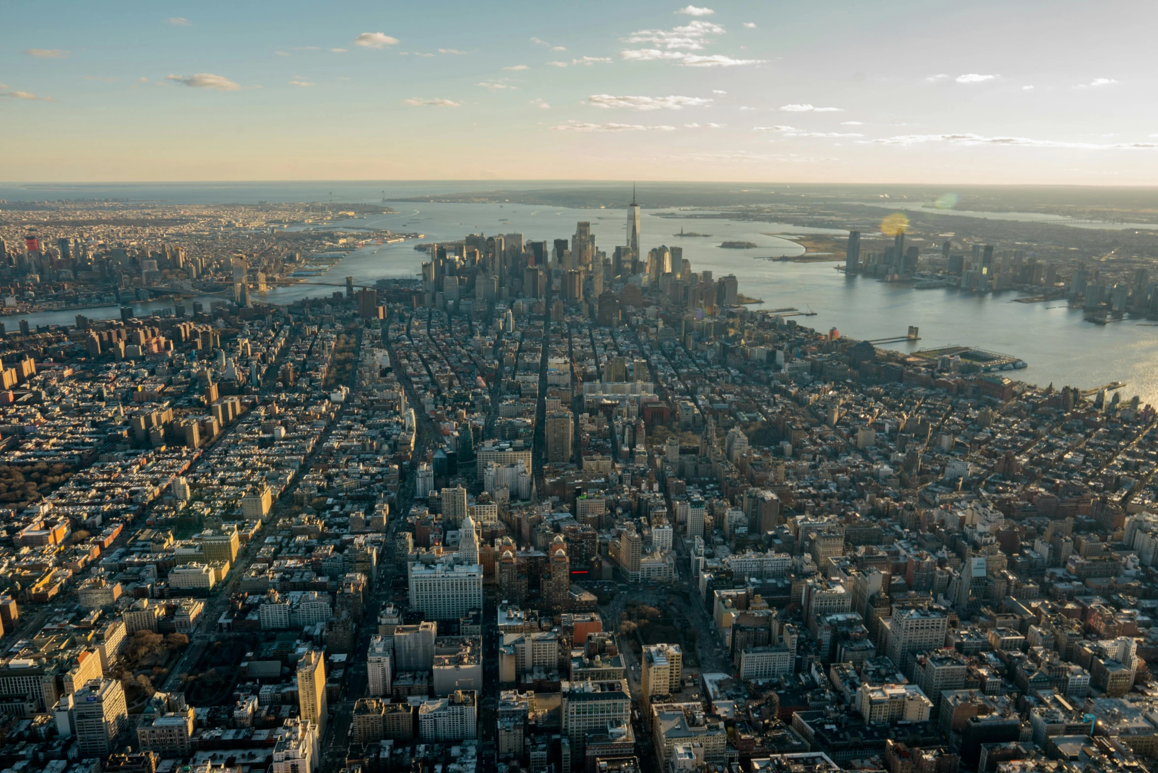 there is a large city with tall buildings and lots of lights