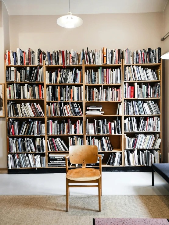 a room with many bookshelves in it