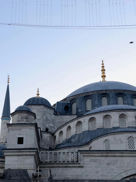 a large church with two towers and two sky scrs