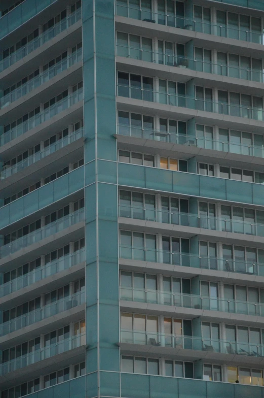 a tall building with several windows in the center