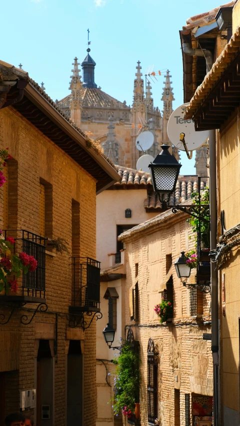 an old stone building in a courtyard of a colonial city