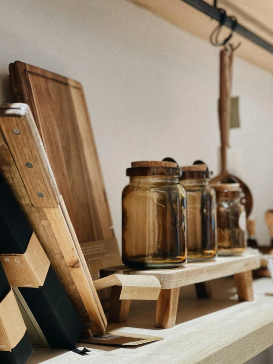 some shelves and wooden objects sitting on a wall