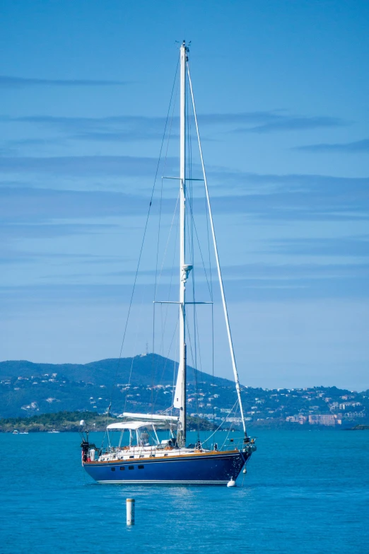 a small boat out in the open water