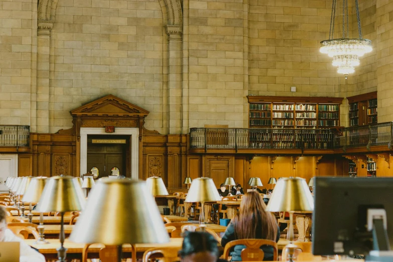 a group of tables with lamps in an old building