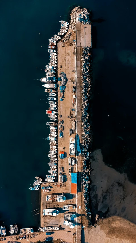 a very big wooden structure that has many boats in it