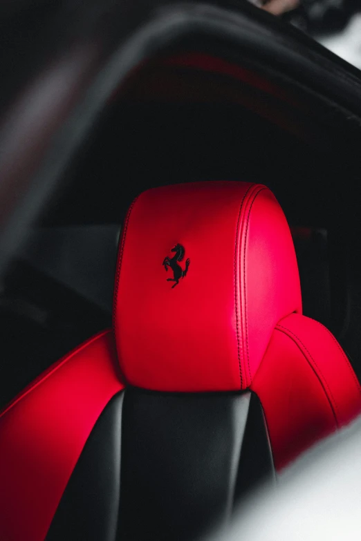 an image of a red car seat in the dark