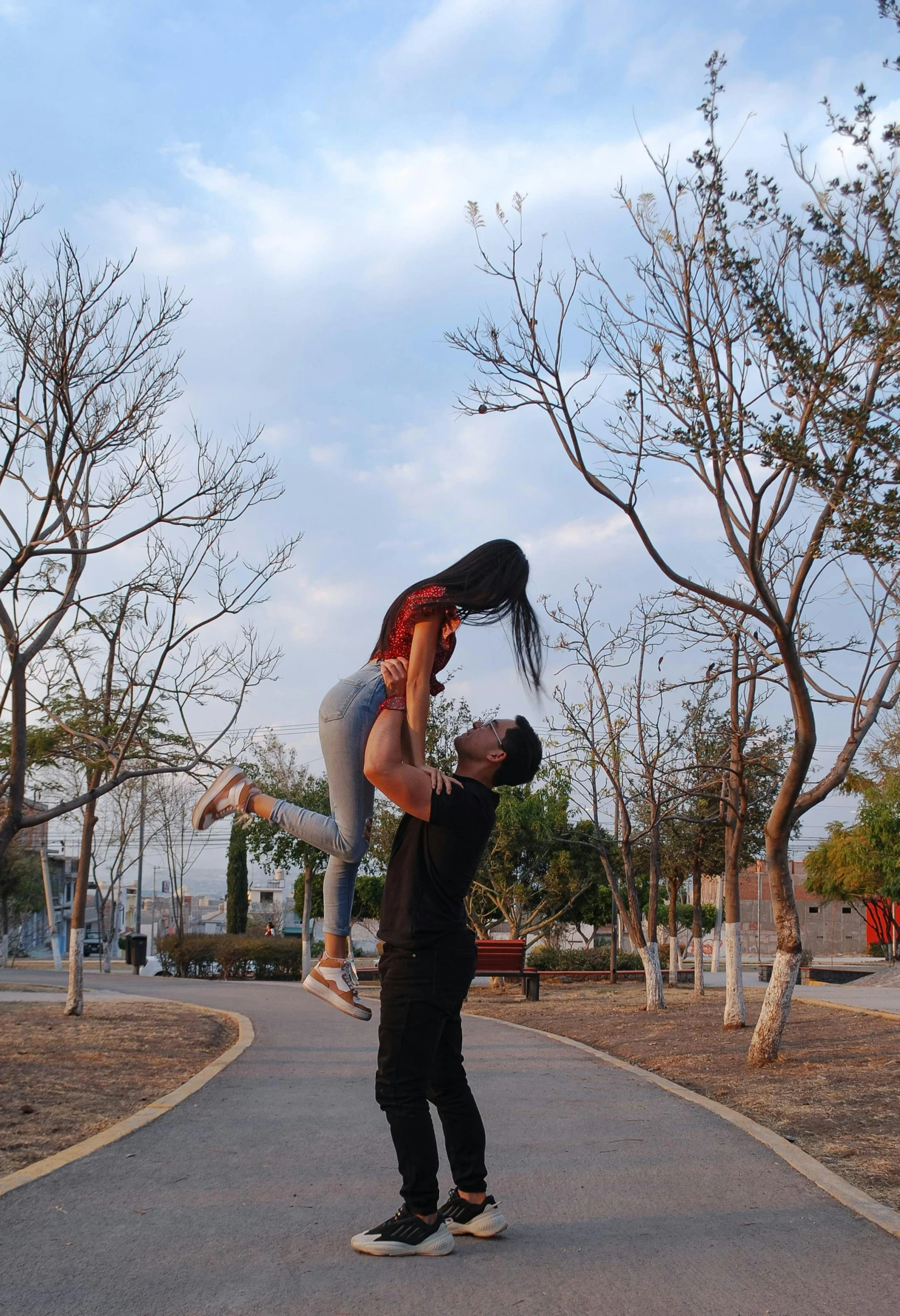 a woman on a skateboard doing a trick