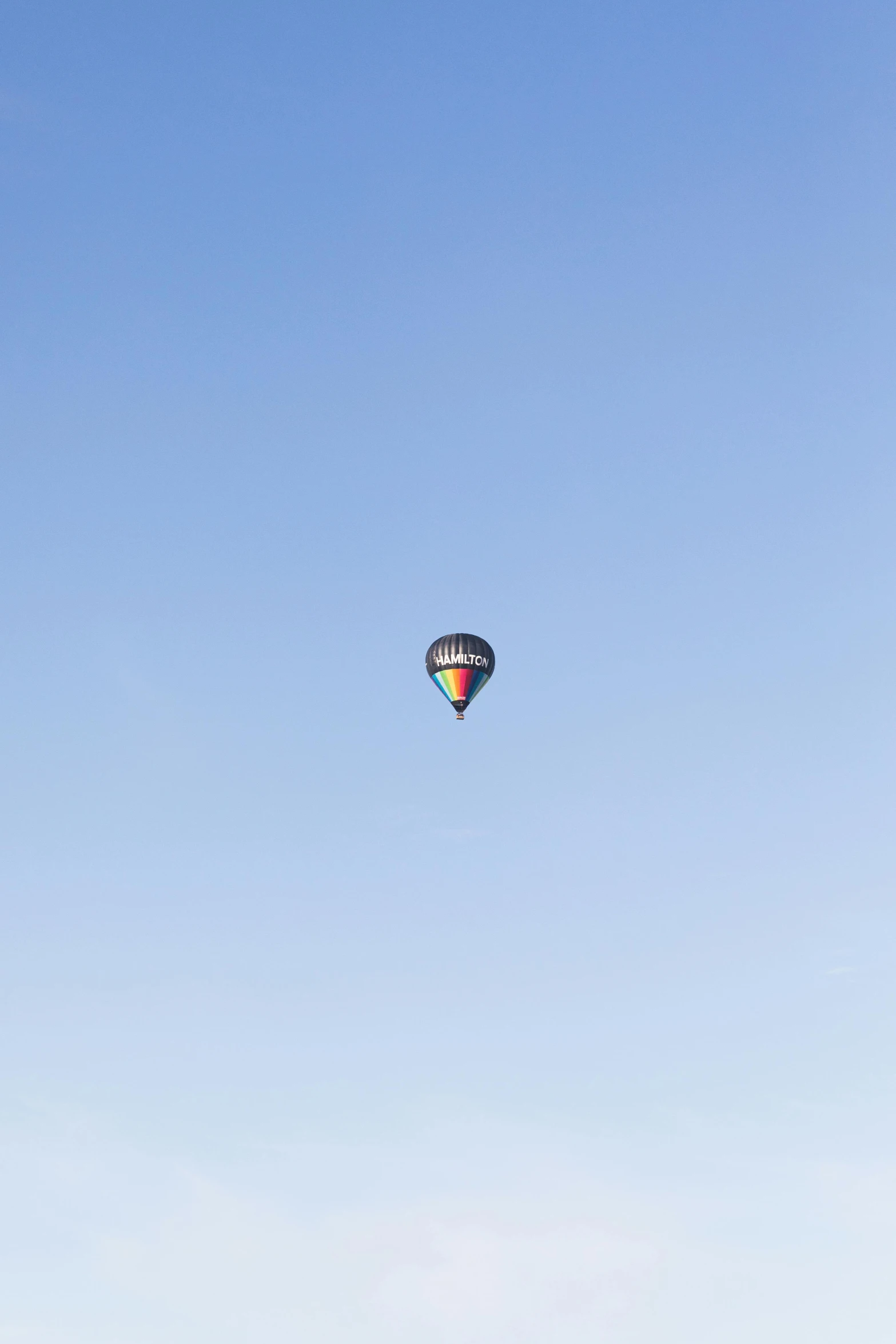 the sky above a field is clear blue